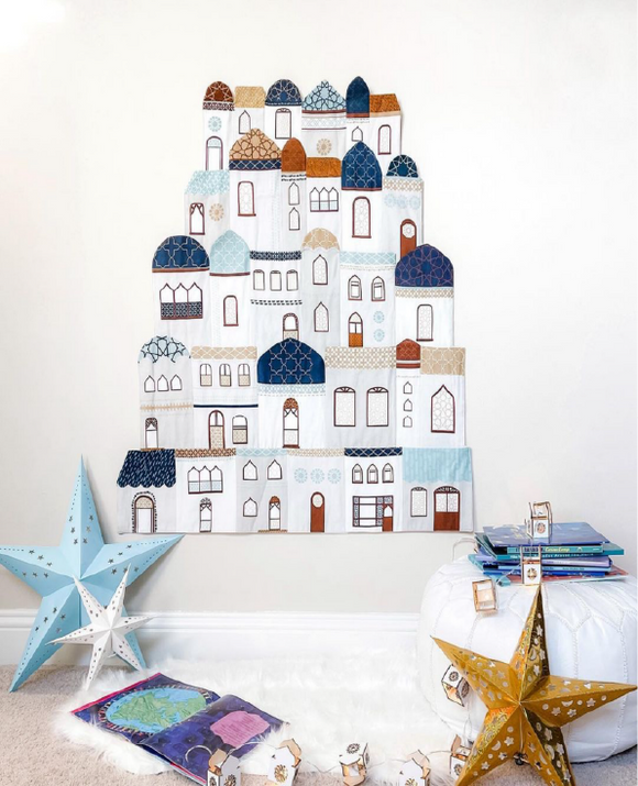 Fabric Ramadan calendar with mosques, shops and libraries